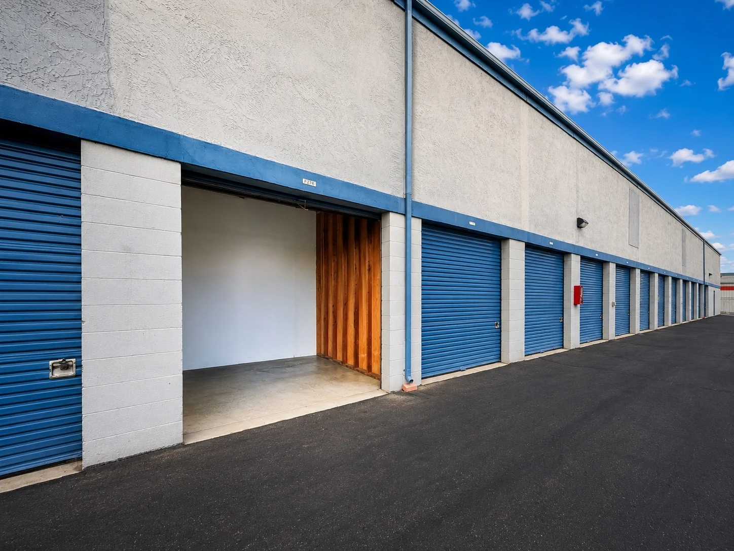 Clean drive-up storage units with an available unit open