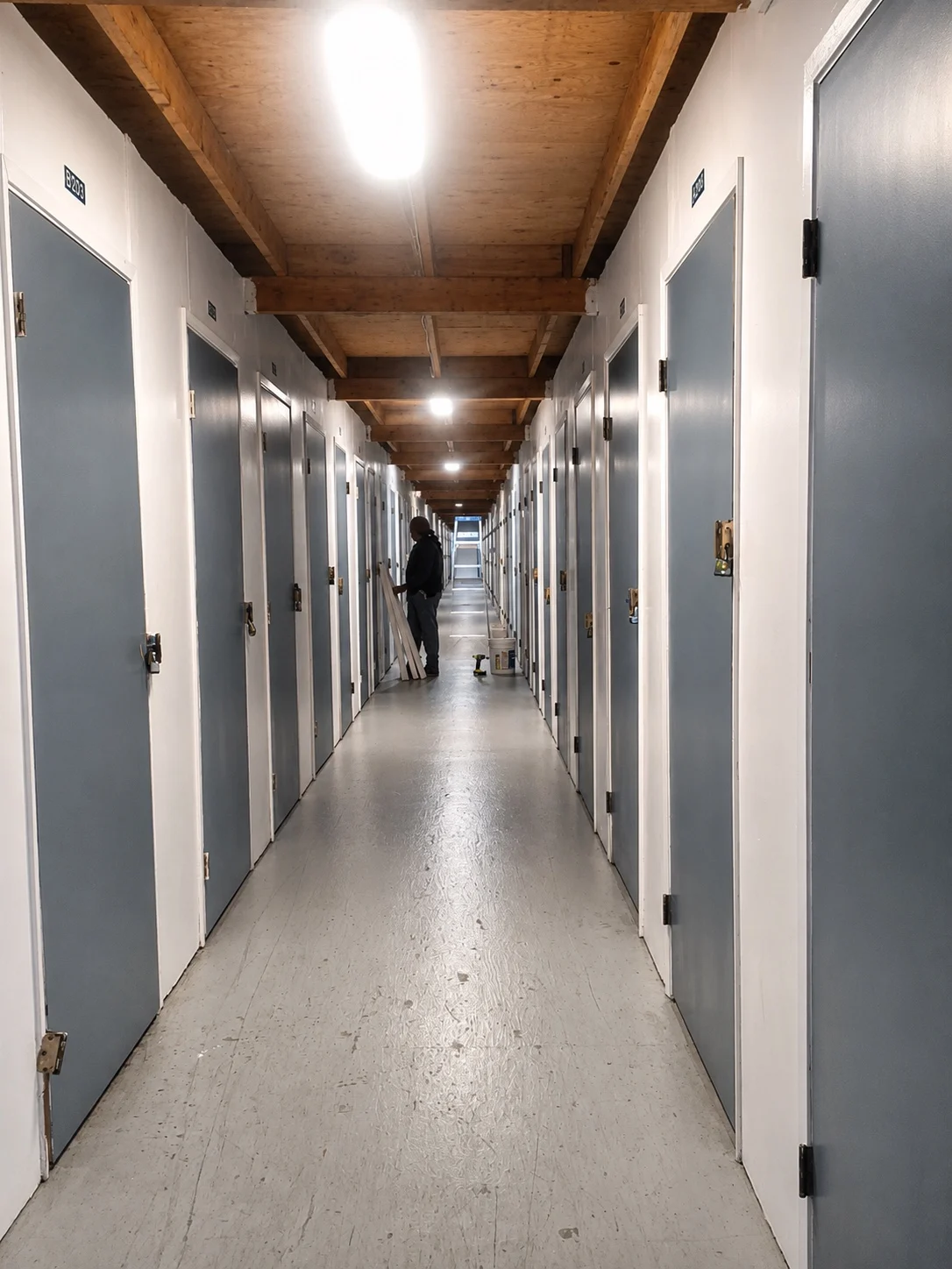 Bright indoor hallway with secure storage units in Pacheco